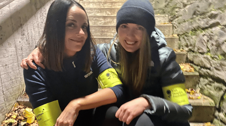 A photo of two women who have completed Irish Hospice Foundation's Never Forgotten Night Run.