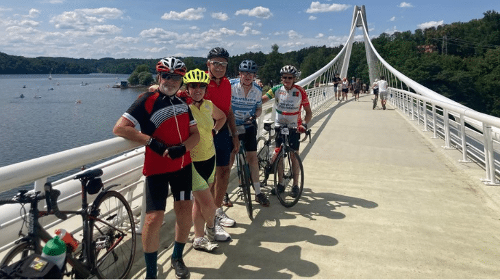 cyclists on a bridge