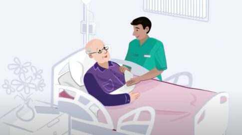 An illustration of an elderly male patient lying in a hospital bed receiving care from a nurse.