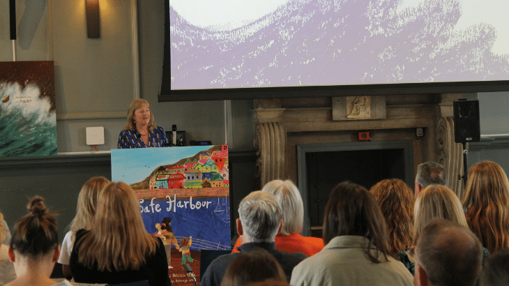 A photo of Maura Keating, National Coordinator of the Irish Childhood Bereavement Network, presenting at the launch of "Safe Harbour".
